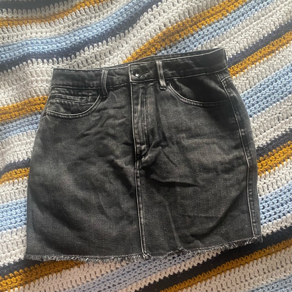 Black denim mini skirt